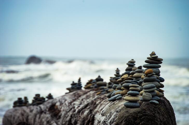 Rocks stacked up on a beach.